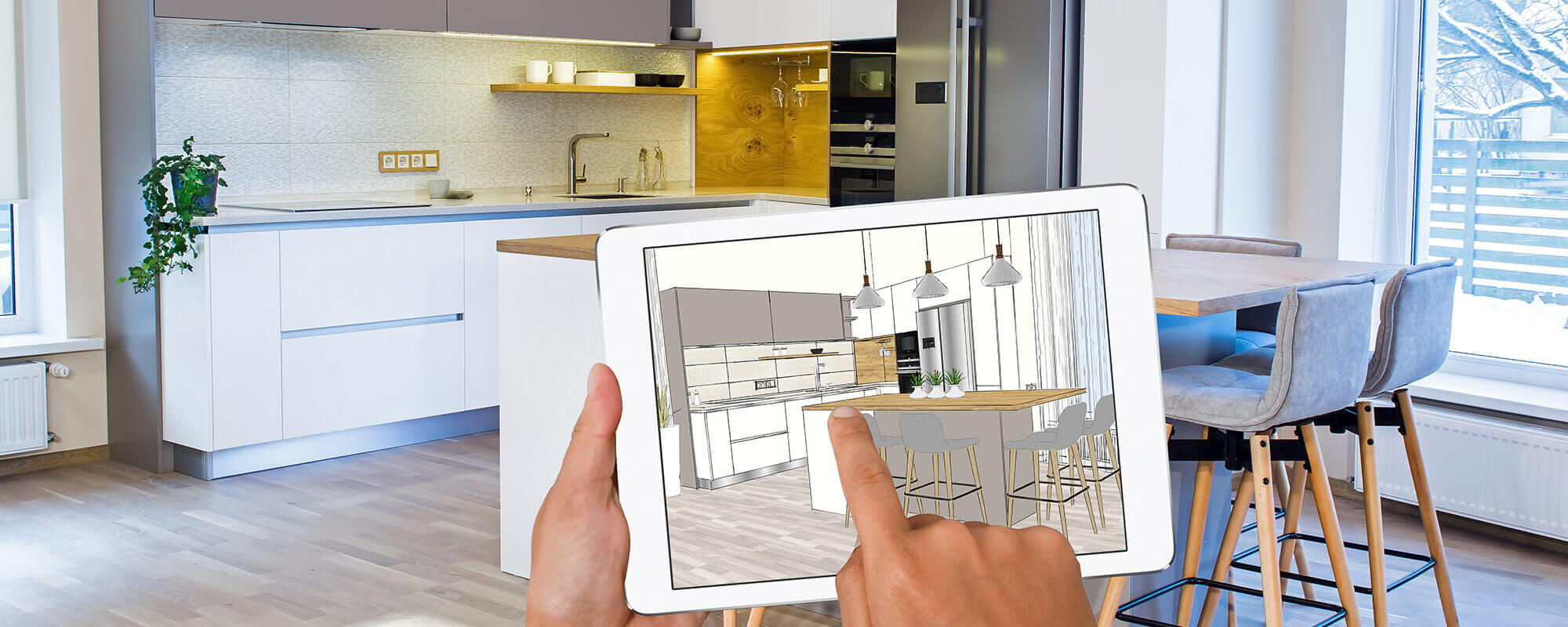Moderne Küche mit digitaler Küchenplanung auf einem Tablet
